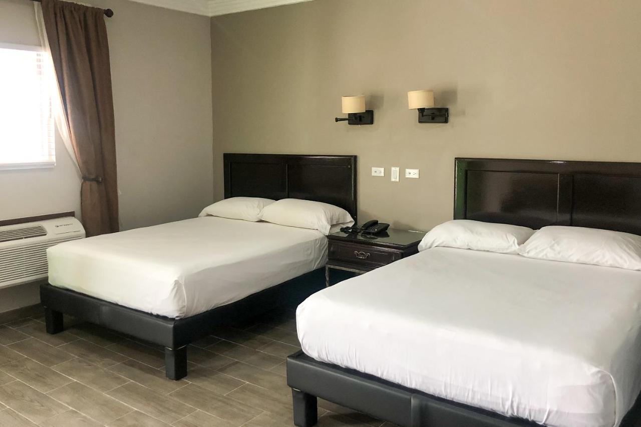 Capital O Palms Hotel, Acuna Сьюдад-Акунья Экстерьер фото